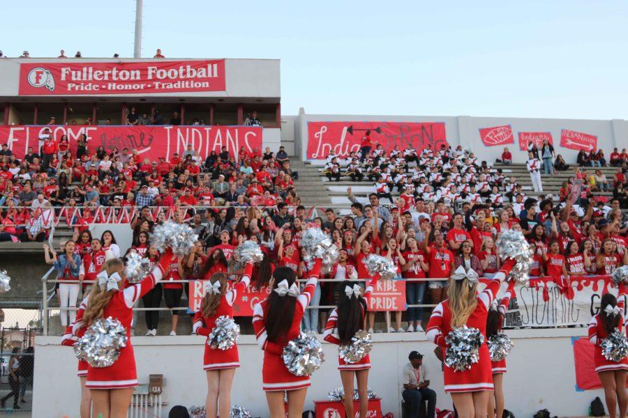 FHS+Cheer+leads+the+student+section+Photo+by+Madison+Velez