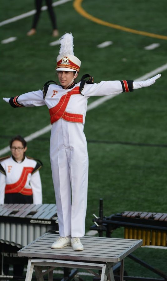 Rebecca De Leon saluting the judges at the last band competition on Oct. 29. Photo by Helen Craft.