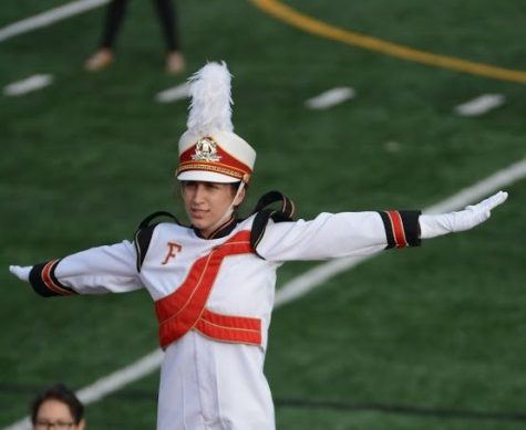 Rebecca De Leon saluting the judges at the last band competition on Oct. 29. Photo by Helen Craft.