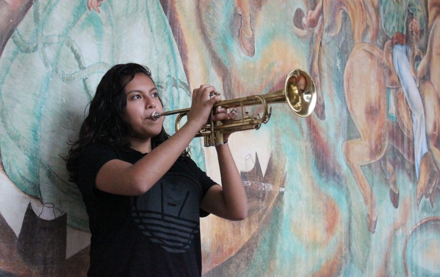 Perez+playing+the+trumpet+outside+of+the+Plummer+auditorium.+Photo+by%3A+Austin+Budnik