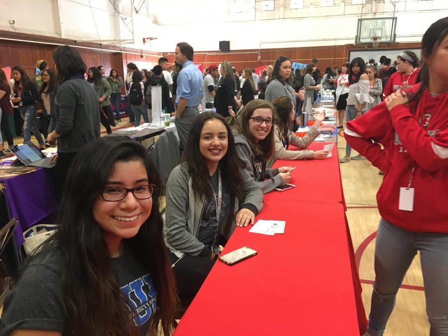 ASB students Katelyn Gomez, Kaylee Nelson, and Angela Lankenau, pose while helping students at the College and Career fair