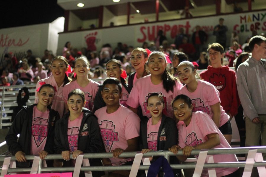 The Indiancers show their school spirit at the Tackle Cancer game.
