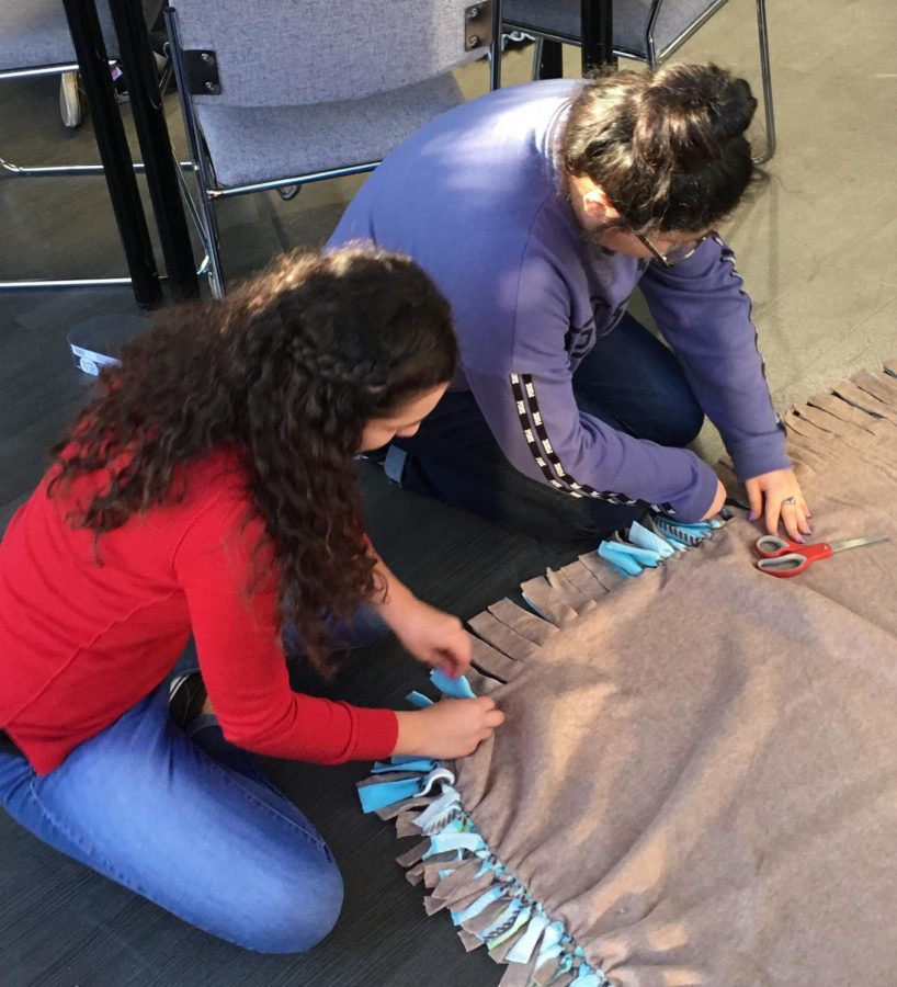 NHS members make no-sew blankets to give to children. Photo courtesy of Mike Muhovich.