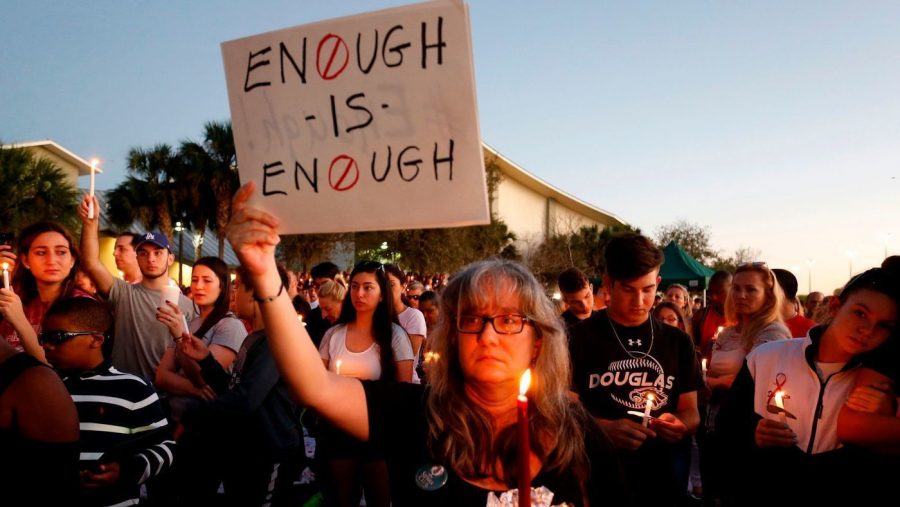 The+Stoneman+Douglas+High+School+community+peacefully+protests+the+recent+shooting.+Photo+courtesy+of+the+Los+Angeles+Times.