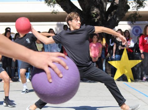 Senior Taylor Garcia throws a ball. Photo by Cordelia Tran.