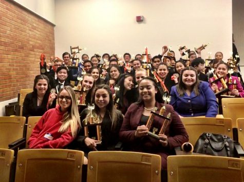 The team shows off their trophies. Photo courtesy of Priscilla Merritt.