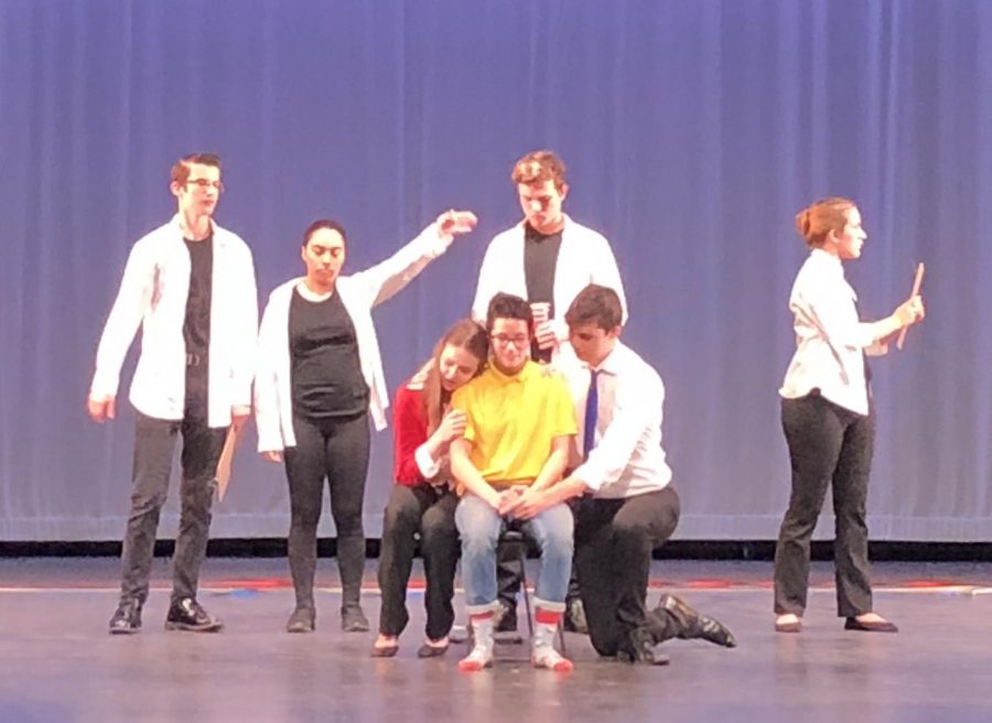 The cast performing a scene from The Yellow Boat. Photo by Michael Despars. 