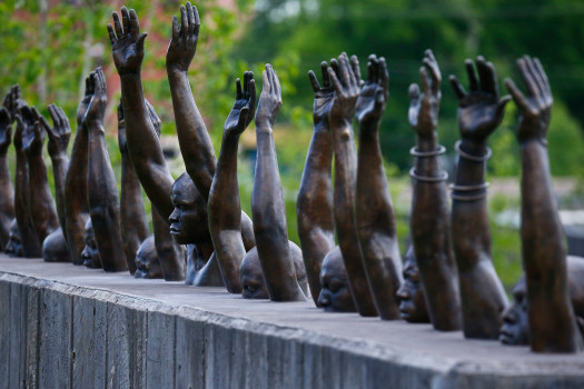 This statue called "Raise Up" is part of a display at  the National Memorial for Peace and Justice. Photo by Brynn Anderson.