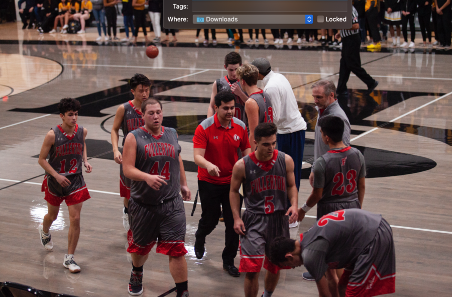 The team walks towards the sideline during a timeout.
Photo courtesy of Kylen Campbell