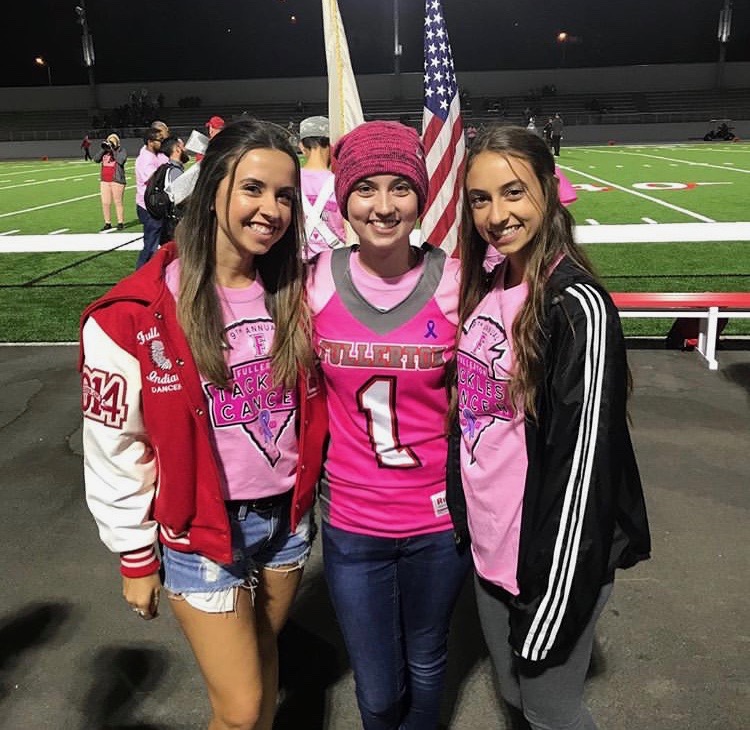 Julia+Monson+%28left%29%2C+Katie%2C+and+senior+Emily+Monson+%28right%29+at+the+FUHS+9th+annual+Tackle+Cancer+game.+%0A%0APhoto+courtesy+of+the+Monson+family.+