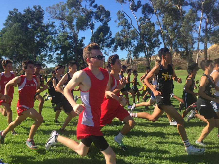 Junior Cyrus Burton runs in the first Freeway League Cluster. Photo courtesy of Nathan Smith.