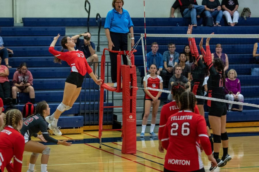 Junior Vanessa Chavez had 19 kills and three blocks in the first League win against Troy. 