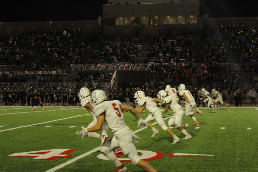 Senior Michael Fernandez kicks off the second half in the 28-21 win against Troy. Photo by Isaiah Zarate.