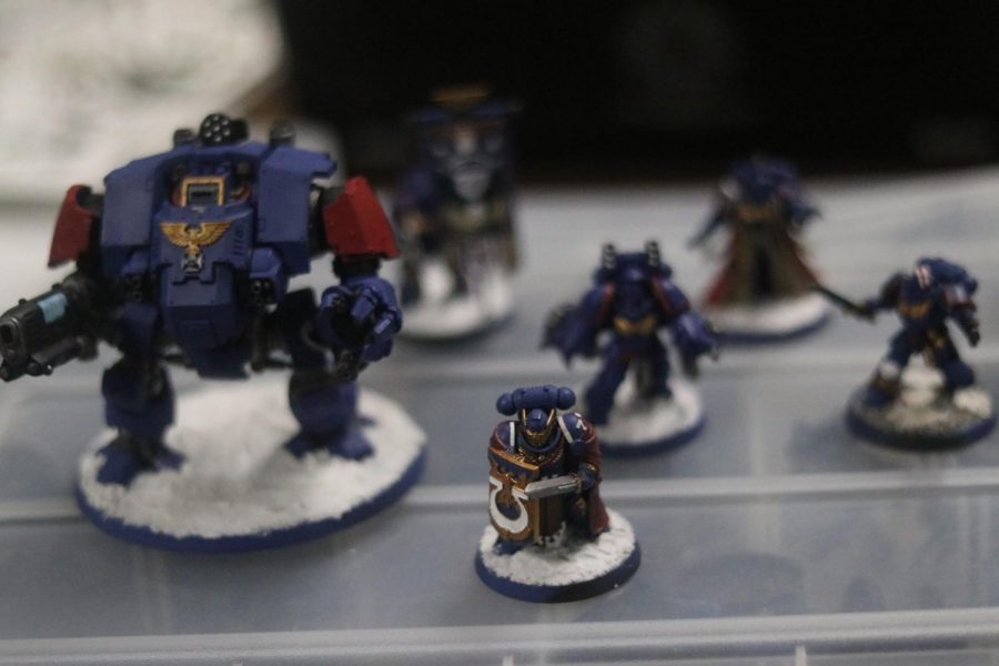 A collection of Warhammer figurines from the same army. These troops are from the “Astra Militarum” army, though their color is junior Timothy Dinh’s decision. Photo by Jose Perez.
