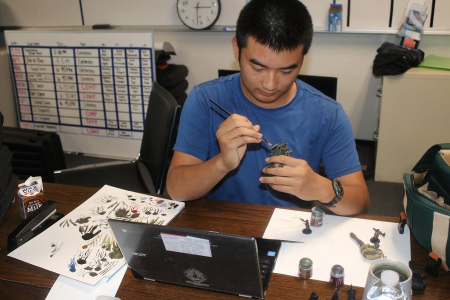 Timothy Dinh was a member of the Warhammer Club. He paints his figurines, choosing the “Astra Militarum” army, in which the quantity of your troops is more important than the quality. They have an advantage when they “swarm” the enemy. Photo by Jose Perez.