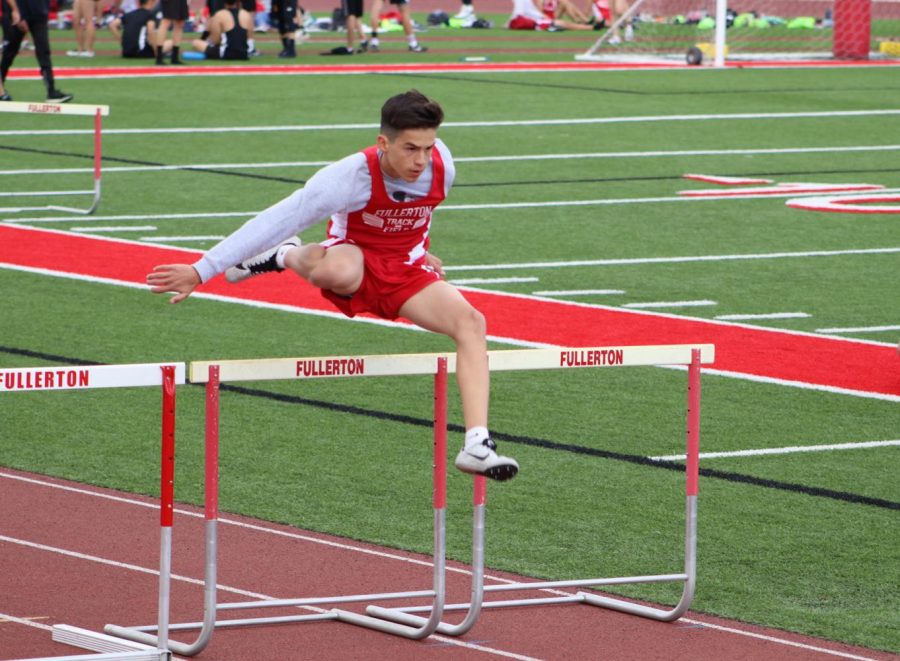Freshman Dorian Yepez placed second in the 110 meter high hurdles on March 7. Photo by Jose Perez.		
