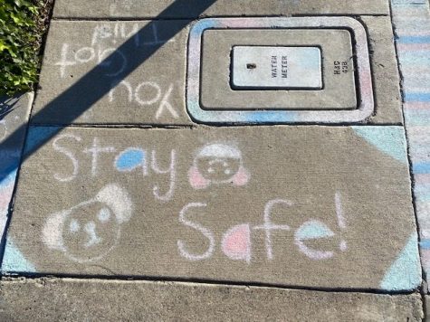 Chalk drawings provide encouragement to neighbors and friends. Photo by Alexandra Williams.