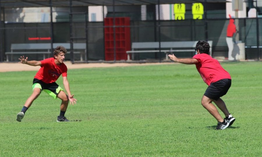 Sophomore Josiah Reed (left) and senior Troy Fregoso (right) run up the field for their social distanced basketball practice on Sept. 3. For indoor practices, the basketball team uses Sonora High School’s gym. Photo by Arashk Alivandi.