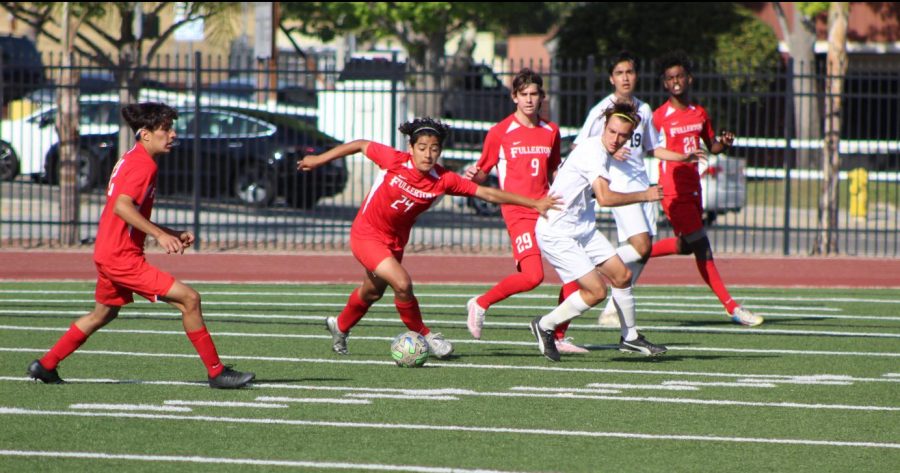 Sophomore+Kenneth+Flores%2C+wing.+Sophomore+Christian+Chavoya%2C+defender.+Junior+Mathew+Ballin%2C+center+midfield.+Junior+Marcus+Yonez%2C+defender.+Photo+by+Laura+Gonzalez.+Photo+by+Laura+Gonzalez.+