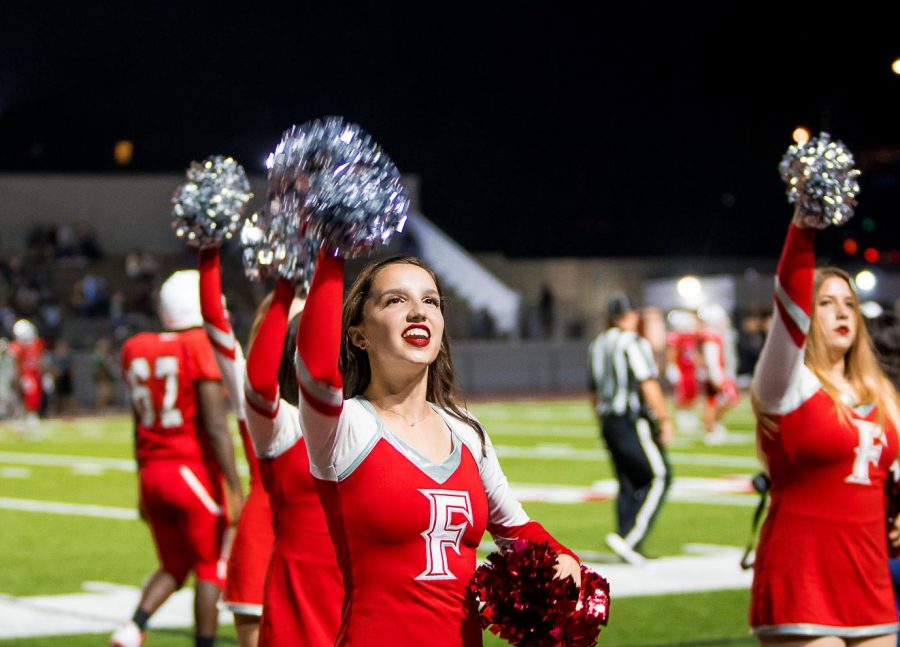 Senior Samantha Dennis performing at Friday night football games with the FUHS Varsity Song Team. Photo courtesy of Samantha Dennis. 