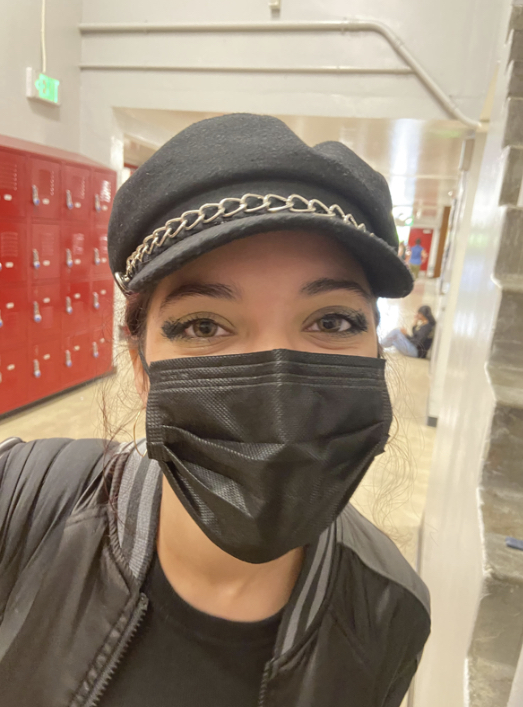 Senior Scarlet Marenco was dress coded for wearing this hat with a small decorative chain. A revised dress code needs to include some common sense guidelines.