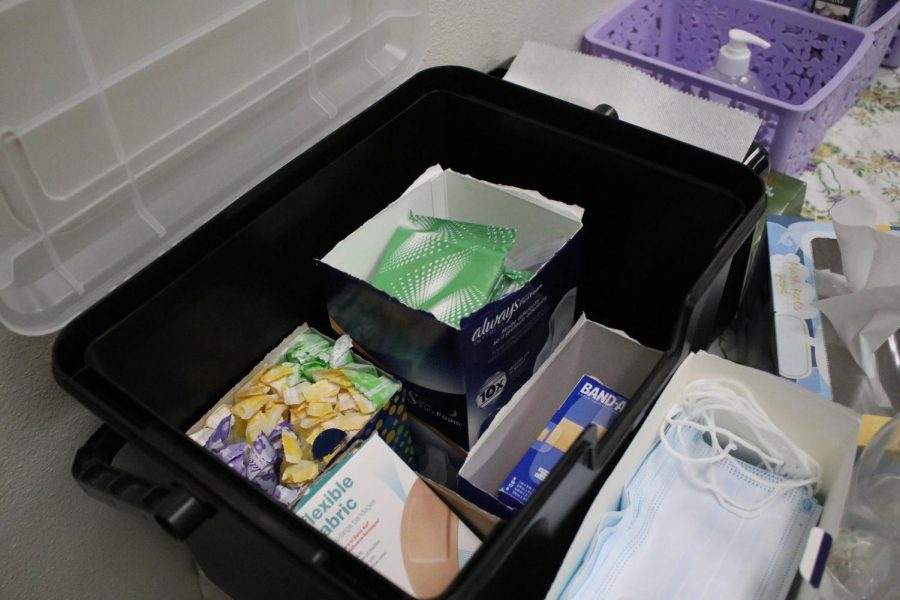 PERIOD club adviser Kimberley Harris keeps tampons and pads in the same box as band-aids. Rather than hiding feminine products, Harris says she wants her male students to become more accustomed to seeing them among other supplies.