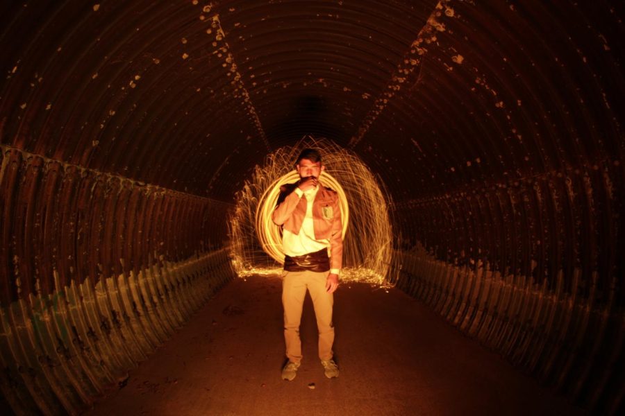 Hernandez used Junior Troy Fernadez as his model in the tunnel photo. To get the wispy effect in the photo Hernandez attached lit up steel wool in a whisk to string and had someone whirl it around behind Fernandez.