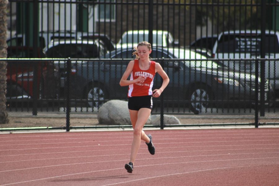 Sophomore Morgan McAndrew leads the pack in the varsity 1600 at the first league meet this season. McAndrew has the second fastest mile time in FUHS history (5:33.74) and holds the cross country 3 mile record (18:21.8).