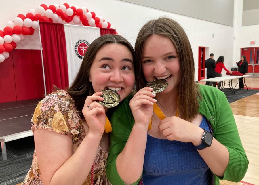 Alia and Frances earned their valedictorian honor and yearbook cords during Senior Awards Night. Frances also earned the seal of biliteracy.