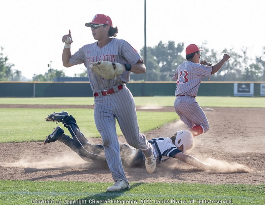 Senior first baseman Jeremy Maldonado makes the last out in the 6-4 victory against Aquinas High School.