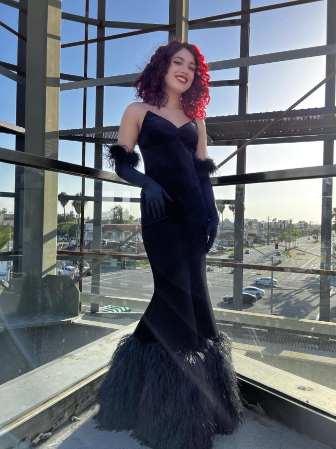 Scarlets prom dress was made by FUHS alumni Blake Danford. The dress was modeled after designer Thierry Muglers dress.