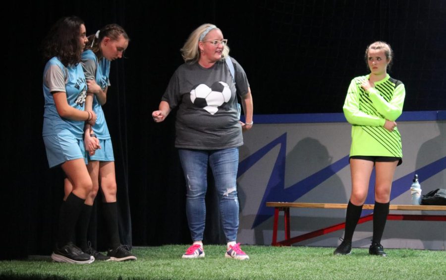 Assistant principal Carey Aiello (center) plays the soccer mom in the FUHS production of The Wolves.
