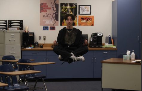 Senior Jude Smith’s photo captures senior Dylan Alvord floating in English teacher Kimberley Harris’s classroom.
