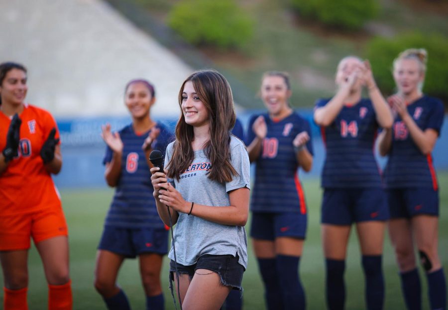 Senior+Alexis+Helmer+performed+the+national+anthem+at+the+Cal+State+Fullerton+soccer+stadium.+Helmer%E2%80%99s+uncle+is+the+CSUF+women%E2%80%99s+soccer+coach+and+asked+her+to+perform.