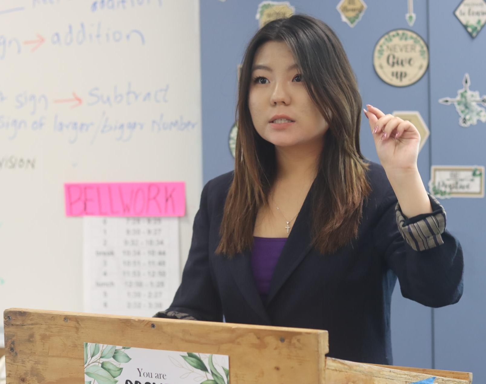 Audrey Bae delivers the “one” speech and affirmed the motion, “This House would establish a permanent host city for the Winter Olympics and a permanent host city for the Summer Olympics.”