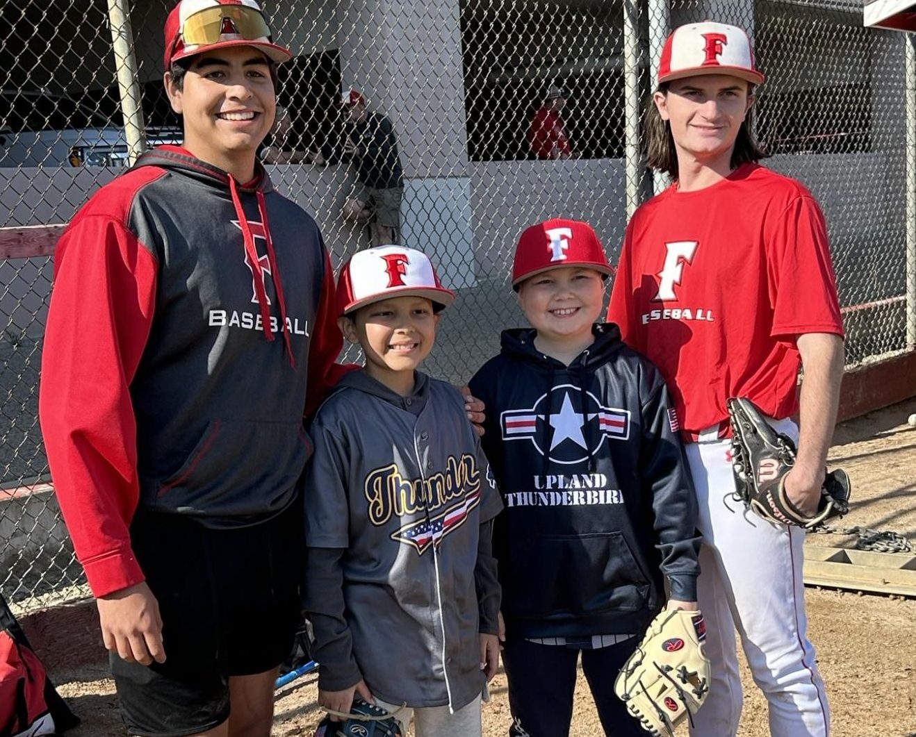 (Left to right) Luke Galvan, Easton Arceo, Mikah Carney, and David Padgett pose together for a photo. Arceo and Carney were aware of Galvan and Padgett’s journey of having childhood cancer, showing living proof that cancer can and will be overcome.
