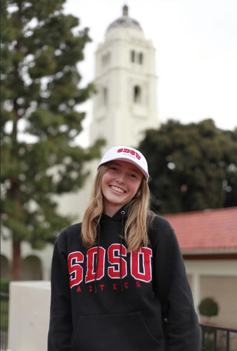 Morgan+McAndrew+took+her+grad+photos+at+Fullerton+High+School+decked+out+in+SDSU+gear.+She+will+be+attending+San+Diego+State+University+in+the+Fall+and+will+major+in+Elementary+Education+and+minor+in+speech+therapy.+%0A