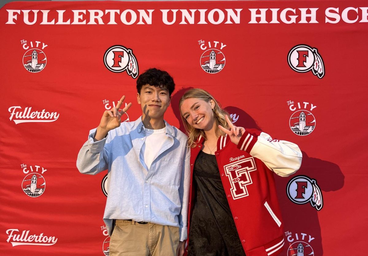 Seniors Isaiah Jung (left) and Reagan Glidewell (right) at the Rotary top 100 celebration.