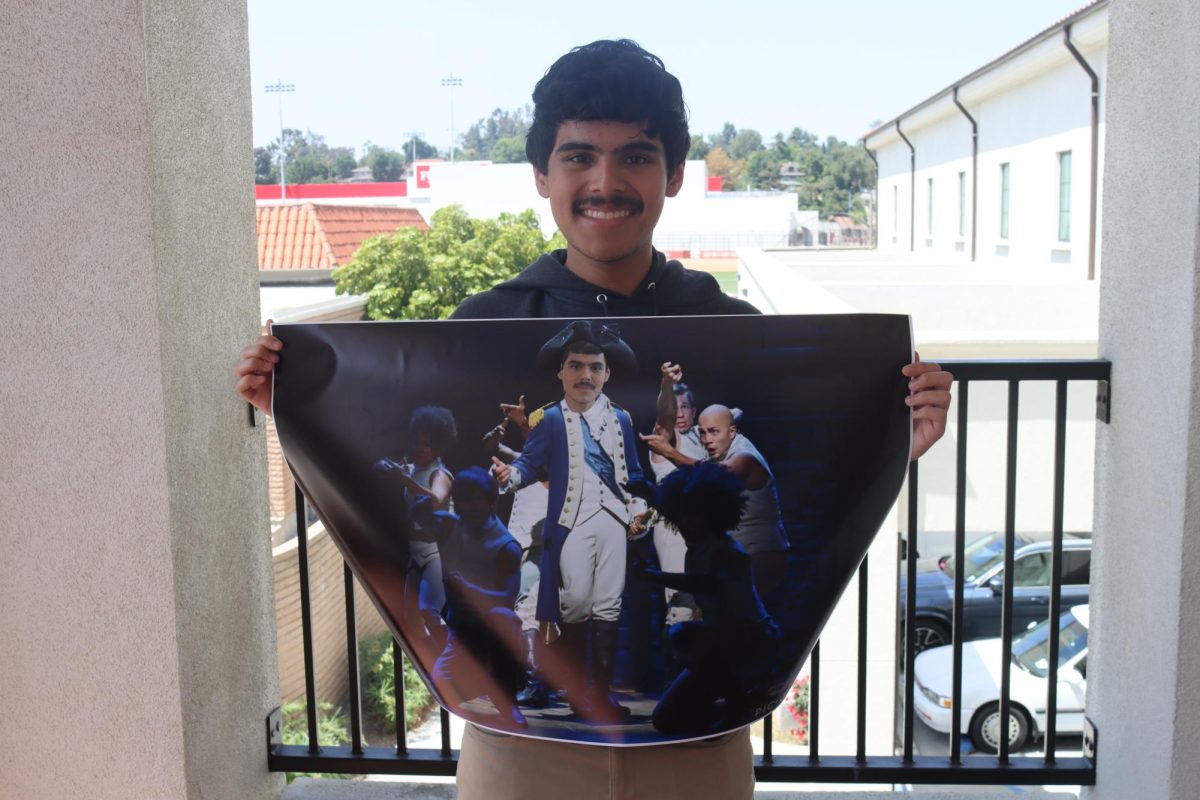 Piña-Villanueva's first real role was as George Washington during an elementary school play. Here, he holds a photoshopped poster created by Eadyn Ochoa.