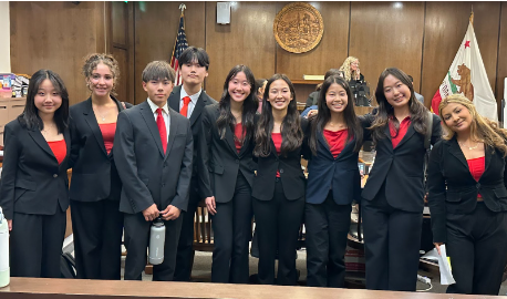 FUHS Mock Trial at their first competition in the OC Supreme Court on Nov. 7. (From left) Jane Kwak, Naiara Curiel, Justin Lukoff, Patrick Hong, Kayla Son, Kaitlyn Choi, Hailey Kwok, Olivia Woo and Camila Cruz. (Not pictured) Lia Kim, Kevin Hernandez Perez, Elijiah Purcell, Yae Han, Kaden Lee, Annette Lee, Alexis Hernandez, Dylan Juarez, Victoria Park and London Molino. (Photo courtesy of Melissa Chavez)