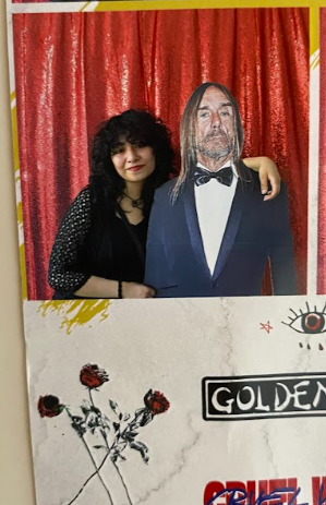 Angelique attended the Cruel World Festival at the Pasadena Rose Bowl. The cutout Angelique took a picture with is of artist Iggy Pop.