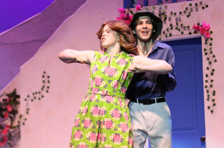 Senior Katherine Timmerman as Rosie attempts to woo senior Malcolm Shirk as Bill in the song "Take a Chance on Me."