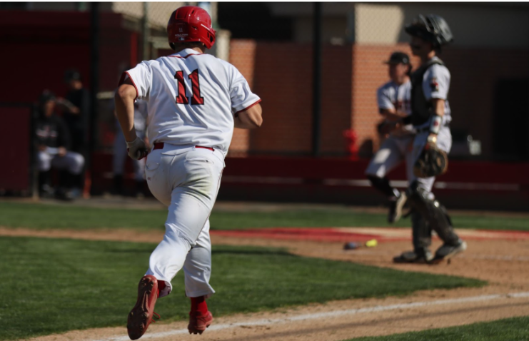 Senior Wayne Warden runs to home plate against Tustin on March 25. (Photo courtesy of Madison Sibal)

