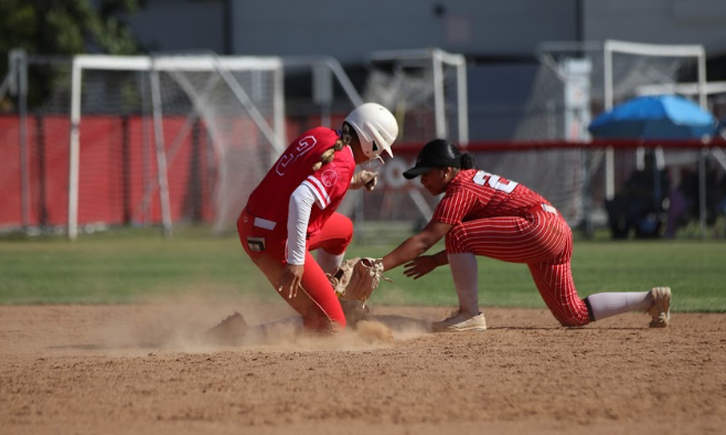 Senior Abby Lee slides into base.