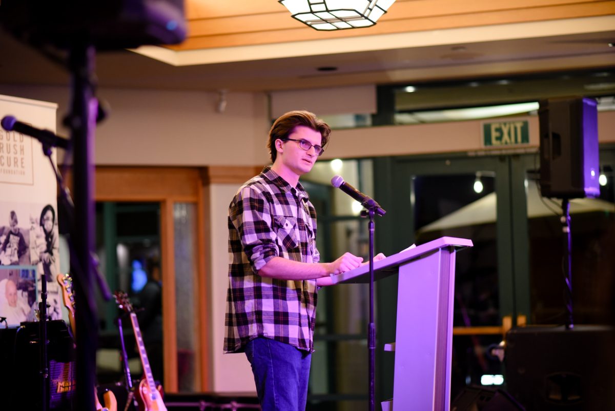 Senior David Padgett speaks at the Gold Rush Foundation party. The Gold Rush Foundation is a non-profit that is dedicated to providing support and hope to children battling cancer as well as to their families. 

