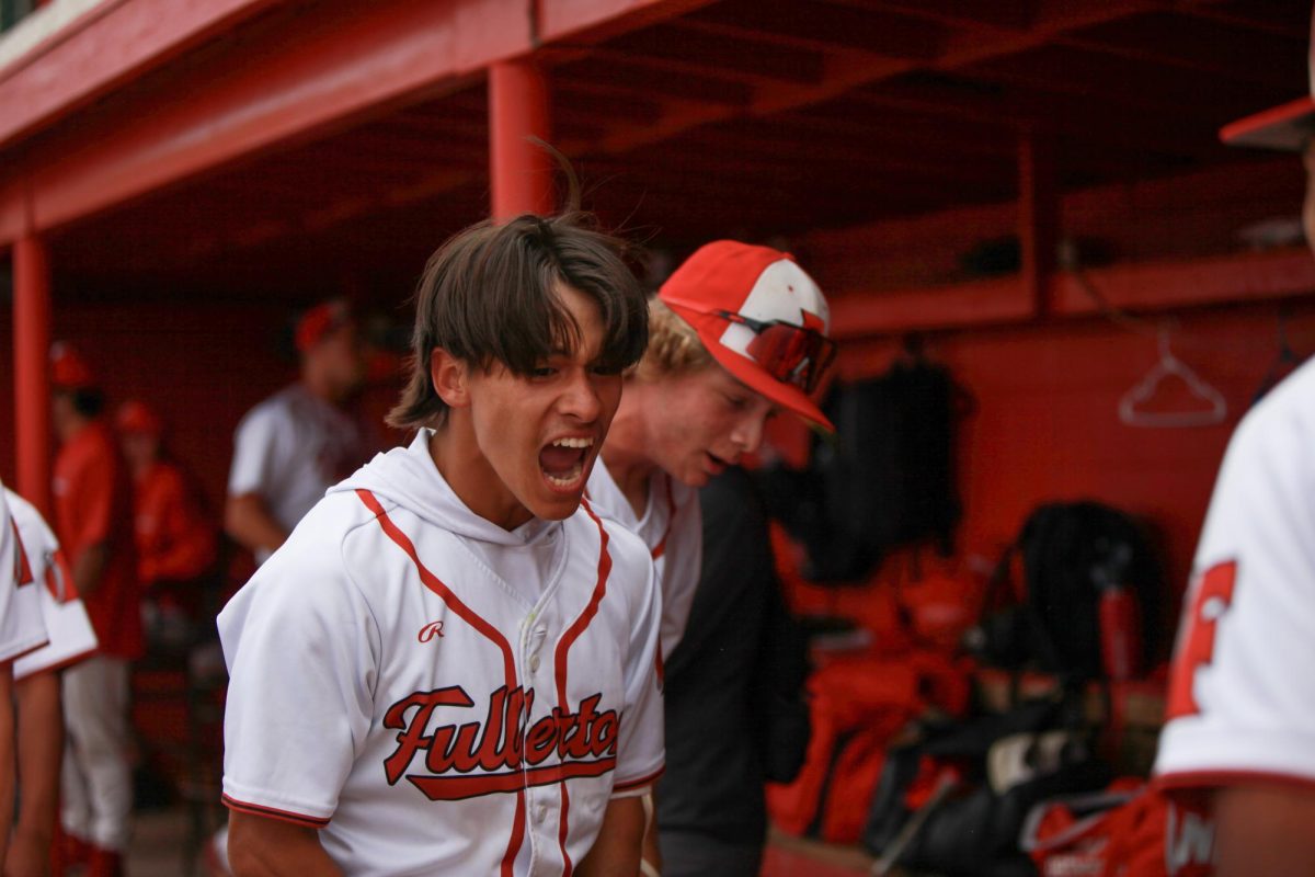 Senior Christian Robinson celebrates after hitting a home run against Calvary Chapel on April 25. Photo by Madison Sibal