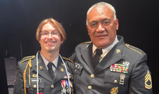 Senior Niall Dunagan and Sergeant First Class Maseleno Pese after a JROTC cadet promotion. (Photo courtesy of Elizabeth Silva)

