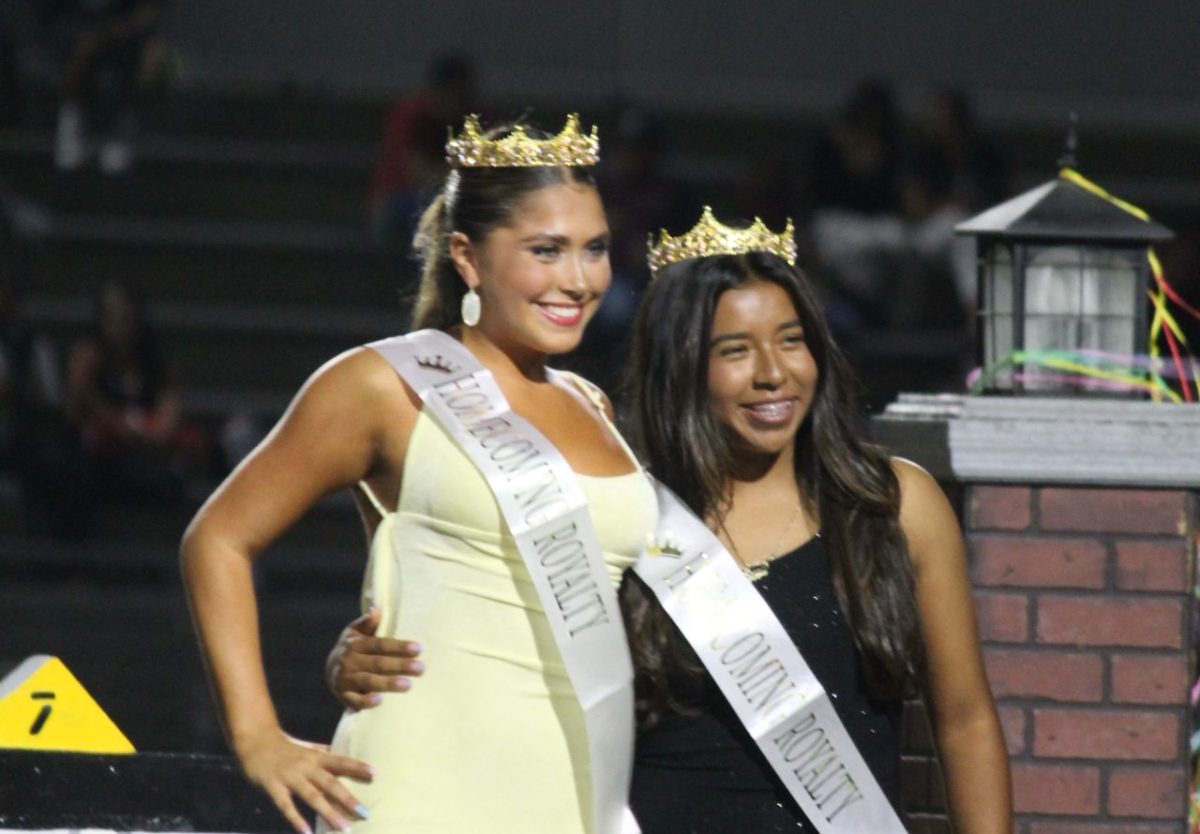 (From left to right) Seniors Kennedy Molino and Ariel Enriquez were crowned as Homecoming Royalty during the halftime ceremony on Sept. 19. Photo by Brody Jones