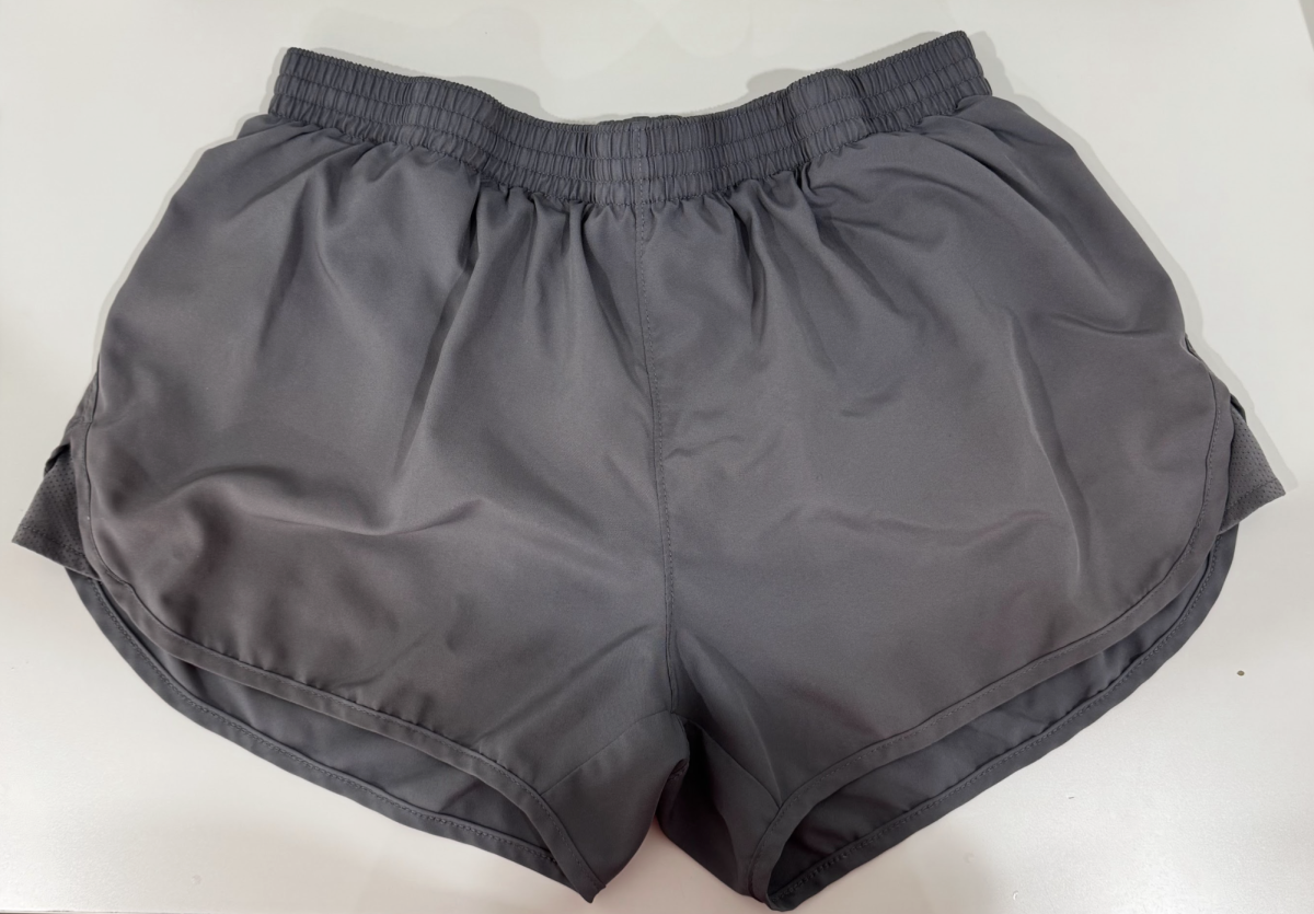 These gray non-branded shorts are the practice bottoms for girls tennis. However, the shorts are too large and do not have pockets for tennis balls. Photo courtesy of Annette Lee.
