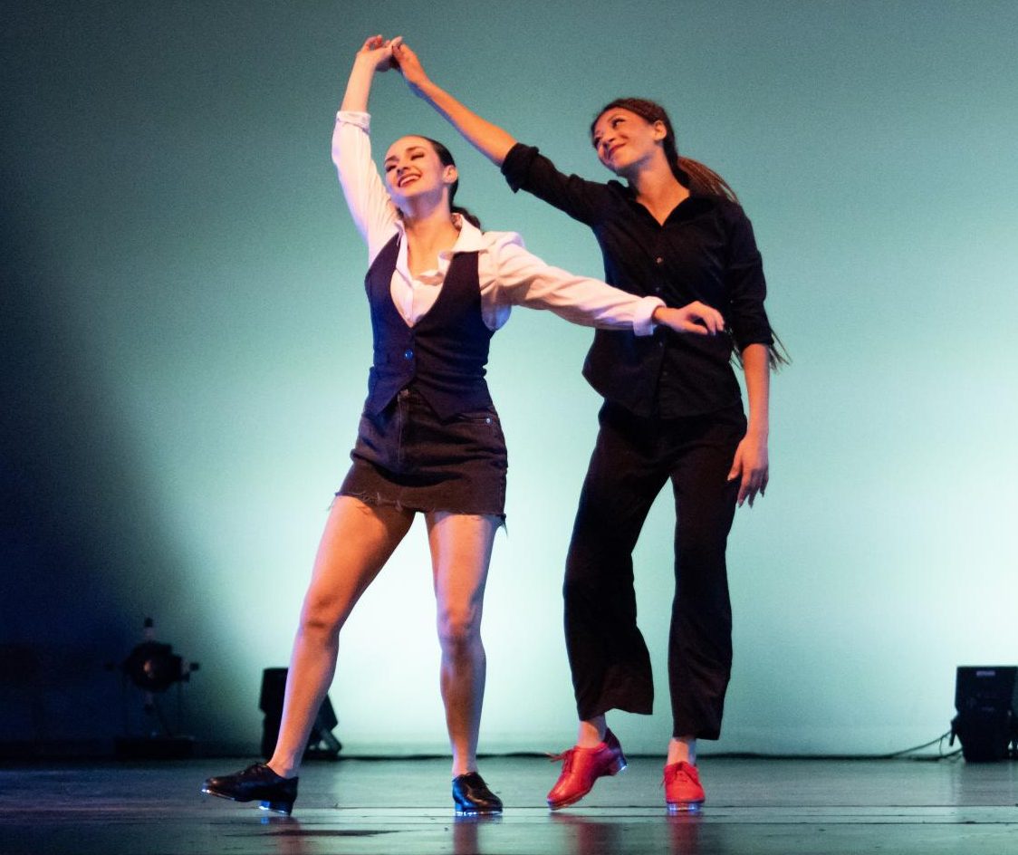 (Left) Andromeda Bruschke dances a tap duet with Rio Gomez.